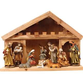 All-in-one Nativity set with 11 fixed resin figures in a wooden shed, featuring the Holy Family, Wise Men, and animals