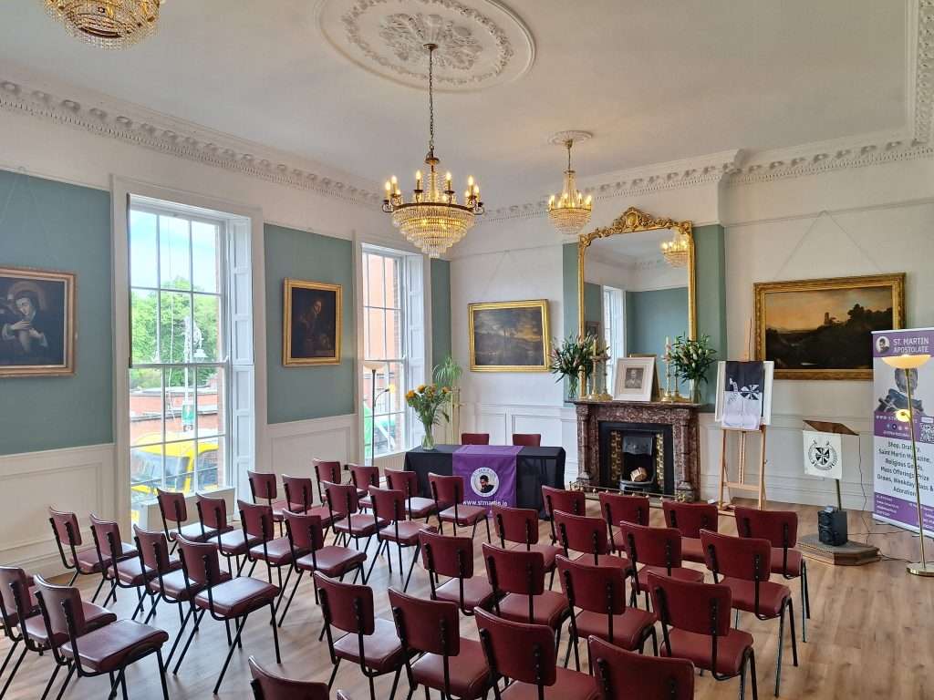 Room No. 42 Set Up for Event or Meeting View of Room No. 42 from the back, set up with rows of chairs facing the front for a meeting or event.