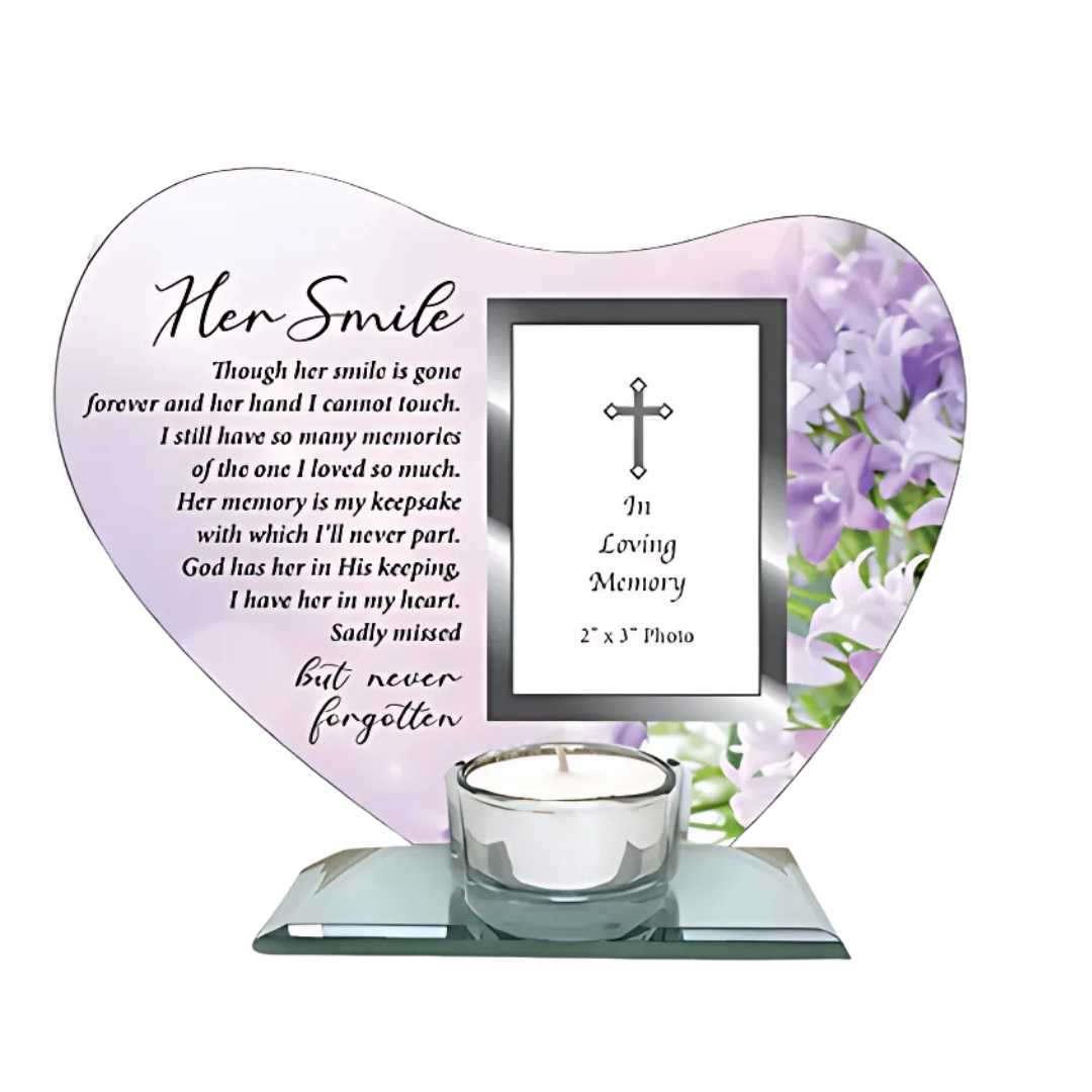 Glass plaque with “Her Smile” message, votive light holder, and photo frame for 2x3 inch image, total size 6.25x7.5 inches, 2.5 inches deep.