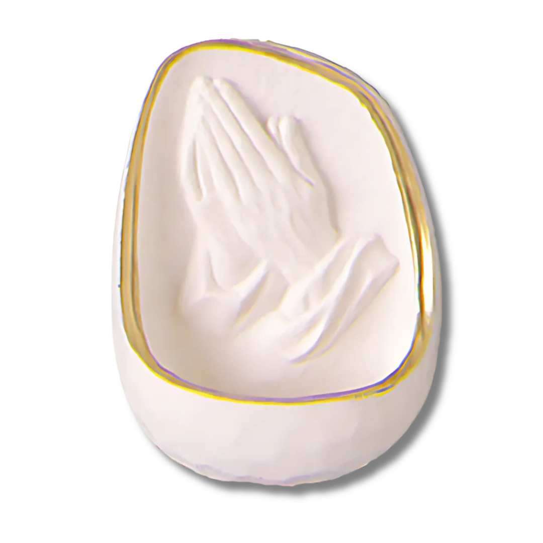 White resin holy water font with gold-trimmed praying hands design, 4.5 inches high.