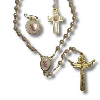 First Holy Communion gift set with cream pearl rosary beads, chalice pin and mini cross with gold detailing