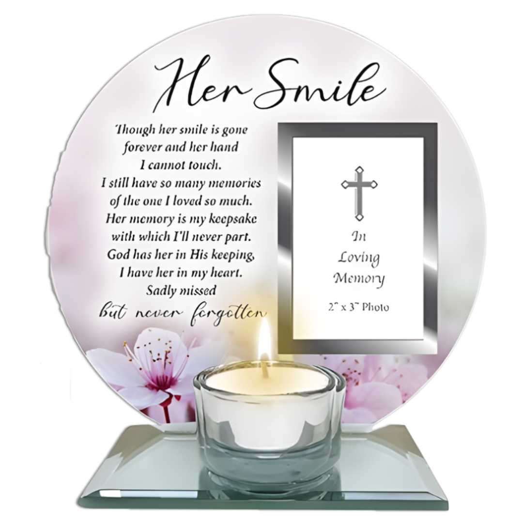 Glass votive holder with silver-effect insert, photo frame slot, and engraved memory verse reading “Though her smile is gone forever … Sadly missed but never forgotten.”