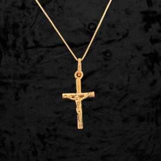 9ct gold crucifix pendant with 18 inch chain presented in a gift box.