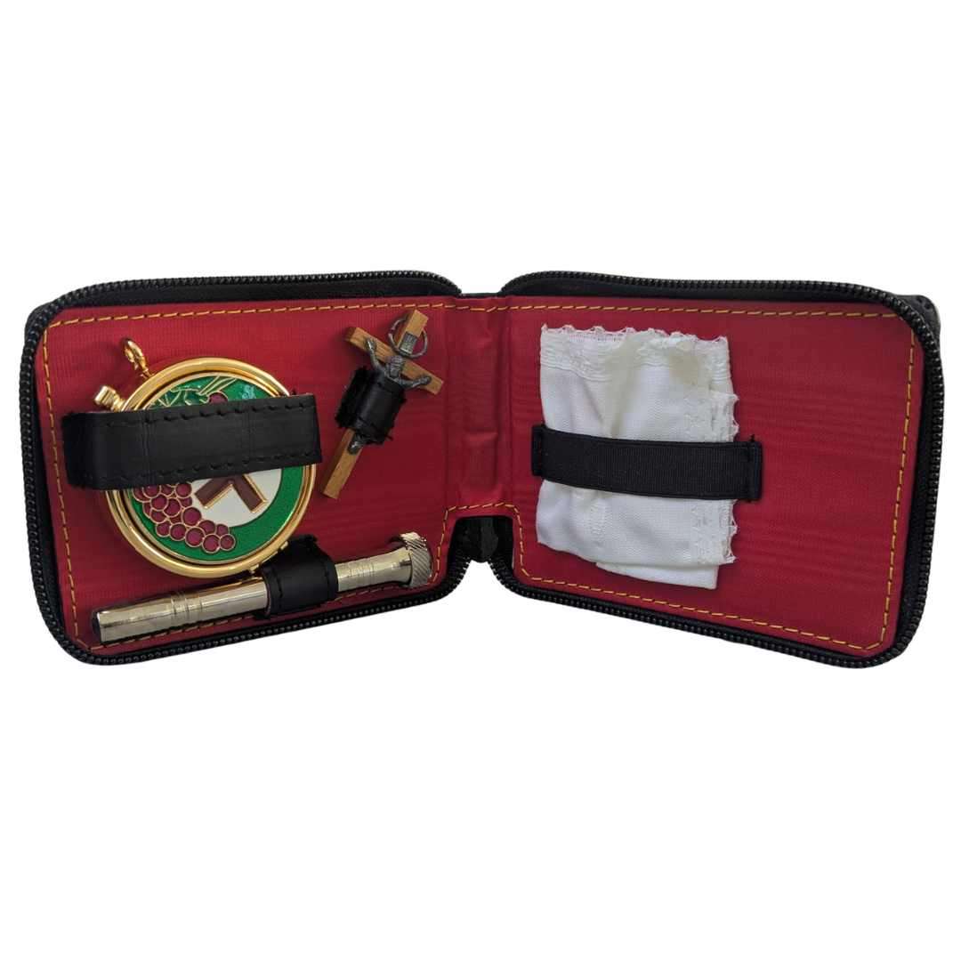 Communion pyx set with grape and cross design pyx, crucifix, sprinkler and finger cloth inside soft carry case.