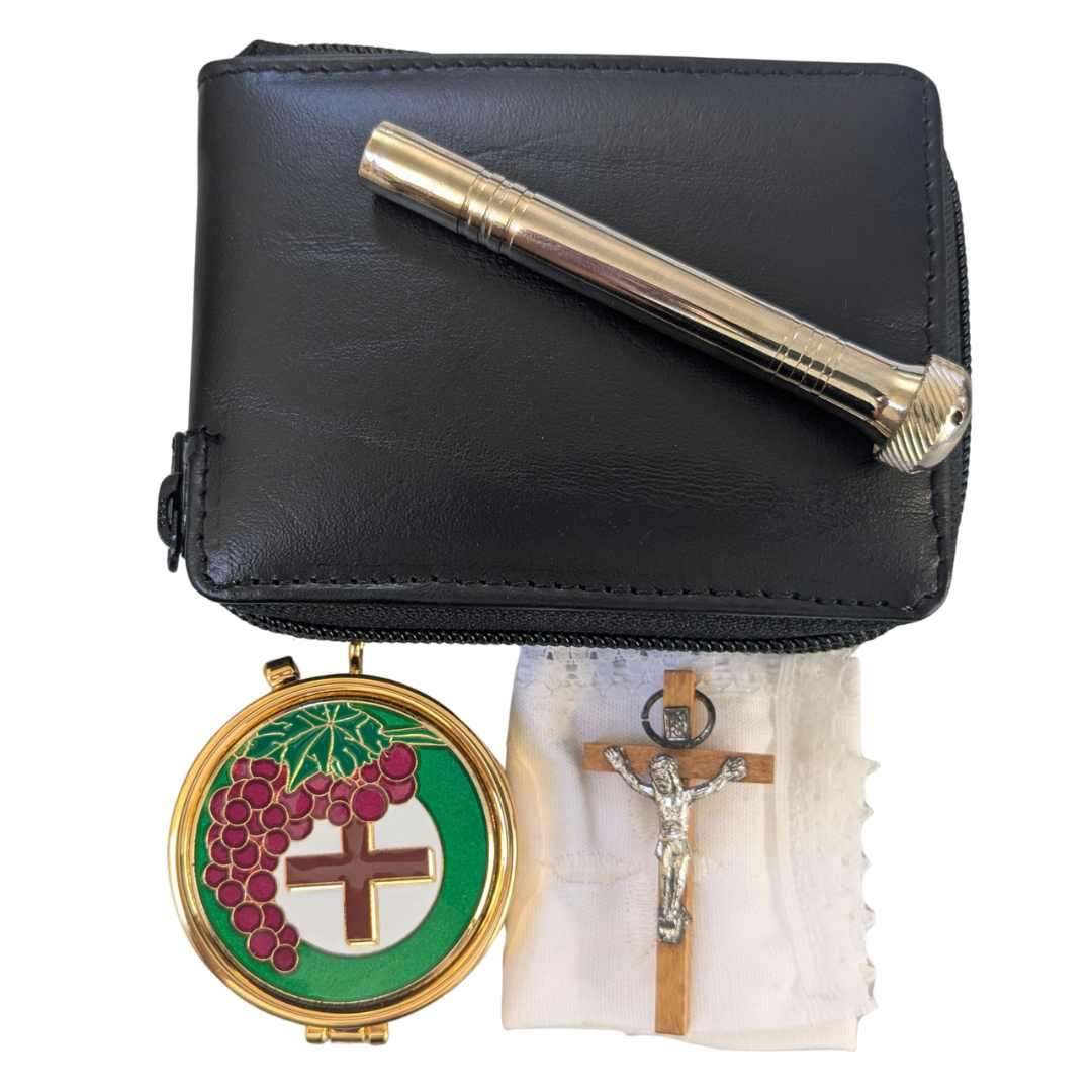 Grape and cross design communion pyx set with crucifix, sprinkler and finger cloth displayed together.